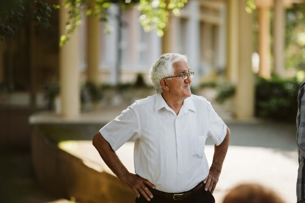 Elderly man enjoying the benefits of visiting the elderly at their home