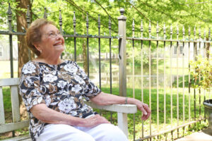 Senior woman enjoying a retirement living near Covington.