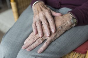Close up of a senior's hands in an assisted living community near Covington